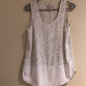 White sleeveless blouse